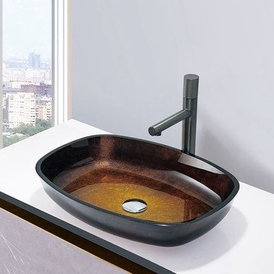 O inclinação Brown moderou bacias que de lavagem do banheiro o melão dá forma a dissipadores de vidro contínuos do tampo da mesa